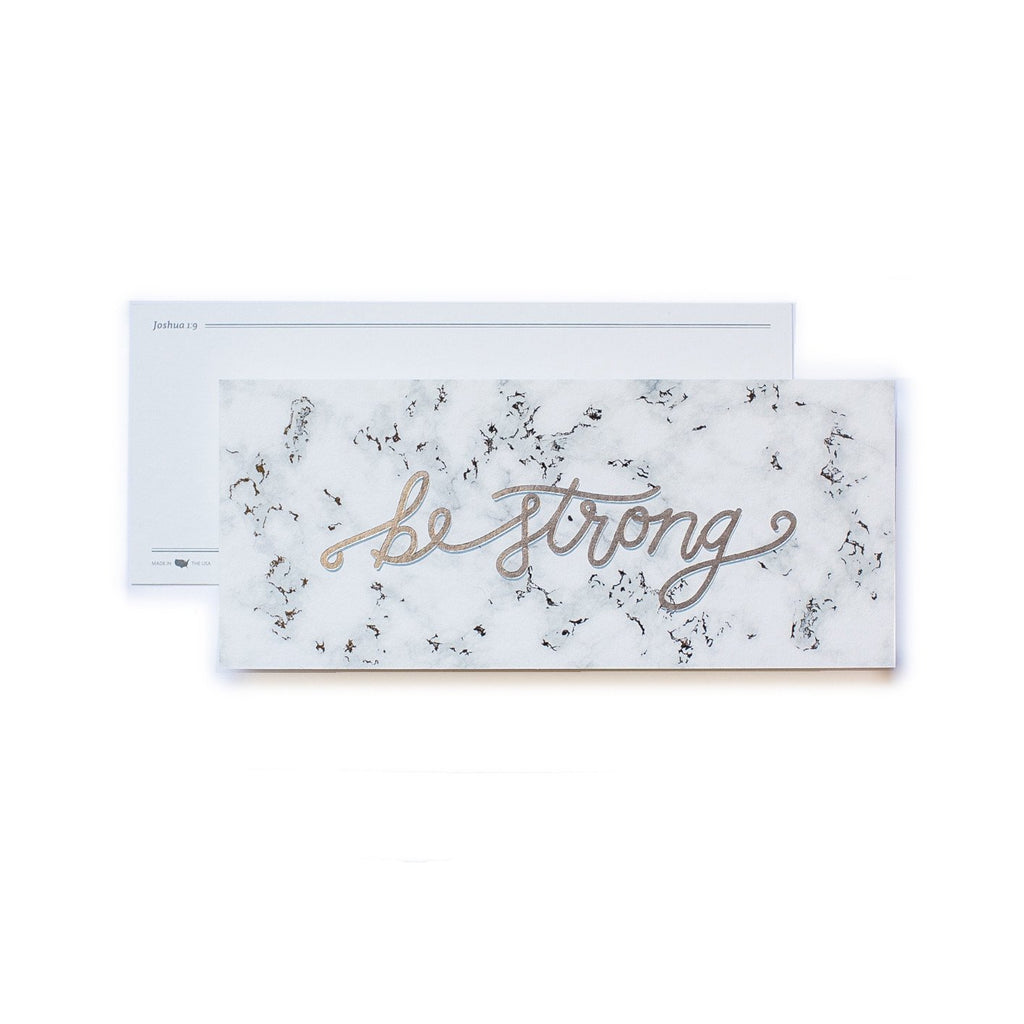 White bookmark with black marble background with gold foil script text saying,