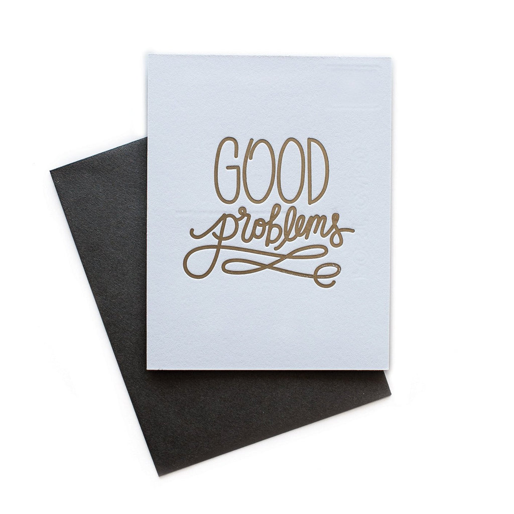 White card with brown fancy text saying,