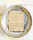 Brown card with black and brown text saying, “Recipe for New Parents: tower of bottles; quarts of formula; 2 desensitized noses; mounds of patience; cups of caffeine; 1 eager grandma. Cover in protective clothing, prepare for attack on the senses. Dress, feed, burp, change, wash, cherish, repeat. Call grandma in desperation.” Image of baby bottle and pacifier in bottom right corner. A white envelope is included.