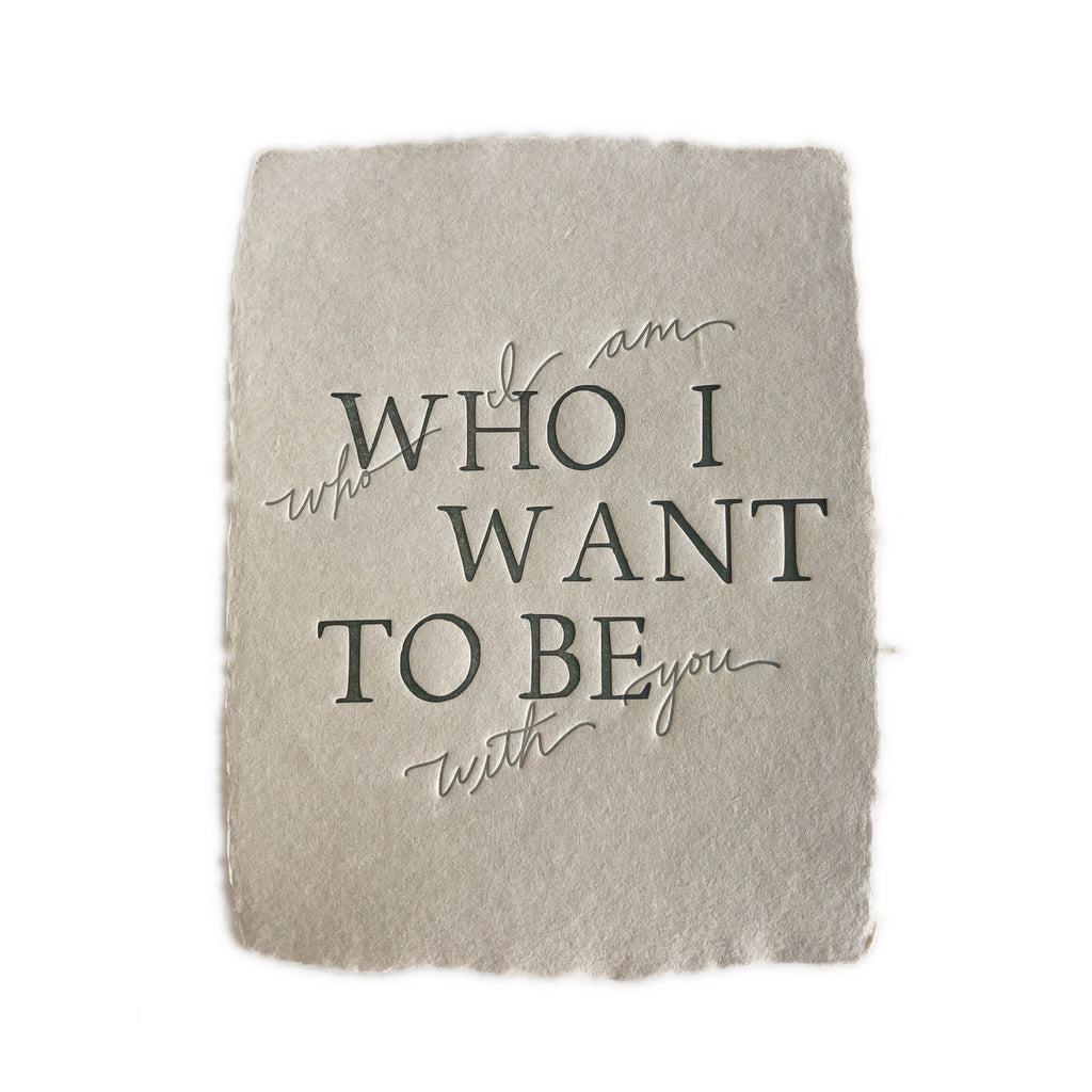 Gray card with torn edges and gray text saying,