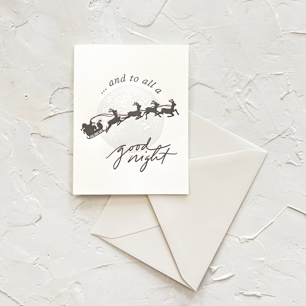 greeting card that says and to all a good night on textured background