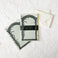 Letter writing sets with decorative cover and envelope on a textured white surface