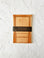 Letter writing pages with a bookcase design and mystery inspired icons