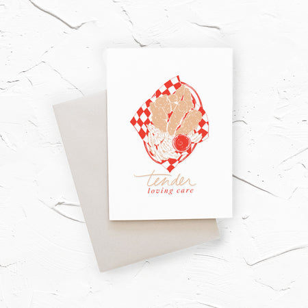 White card with tan and red text saying, 